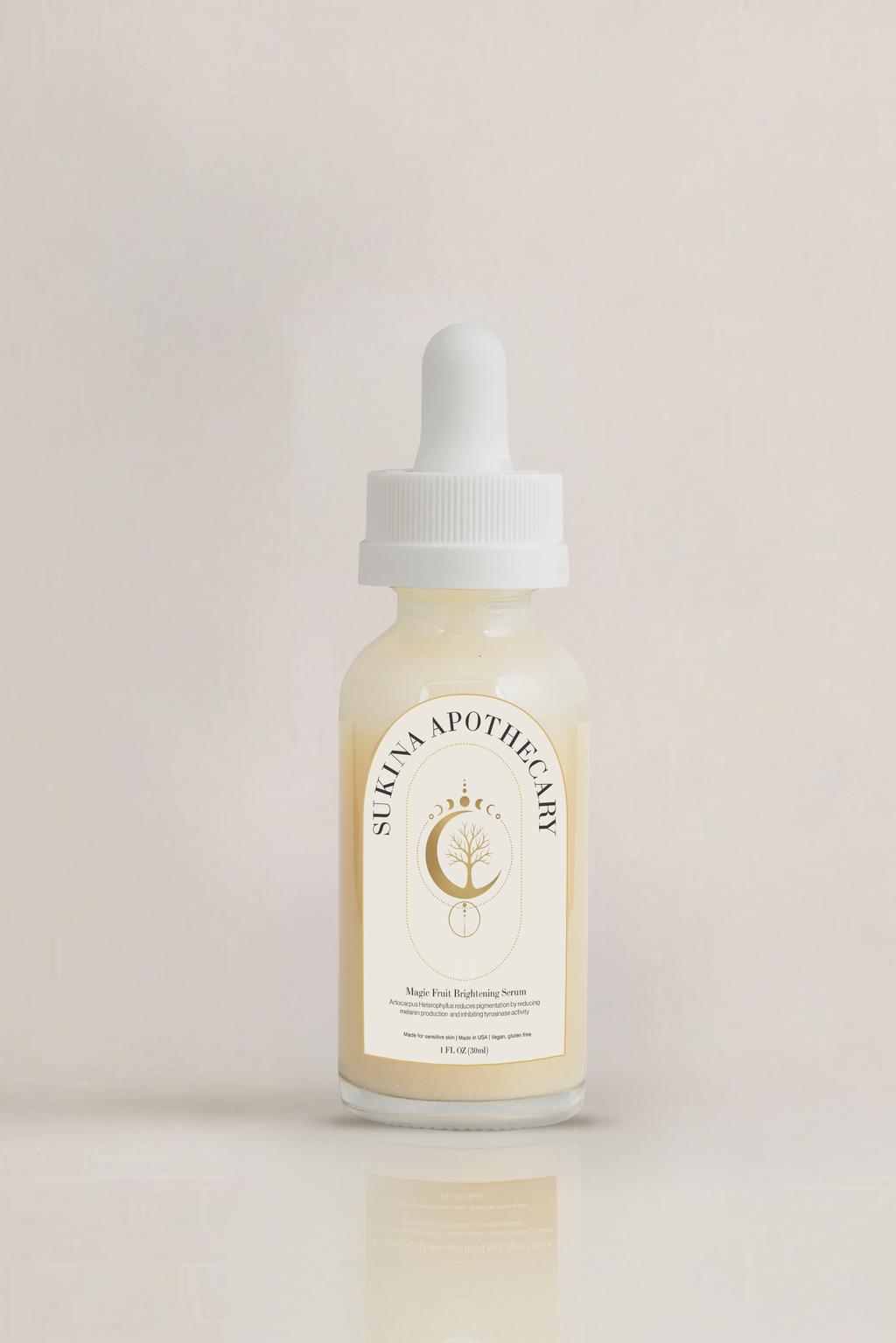 Sukina Apothecary's Magic Fruit Brightening Serum in white dropper bottle with golden label — formulated with Rice Extract, Lentinus Edodes, Tea Tree, and Calendula to reduce dark spots, purify, and enhance skin brightness.
